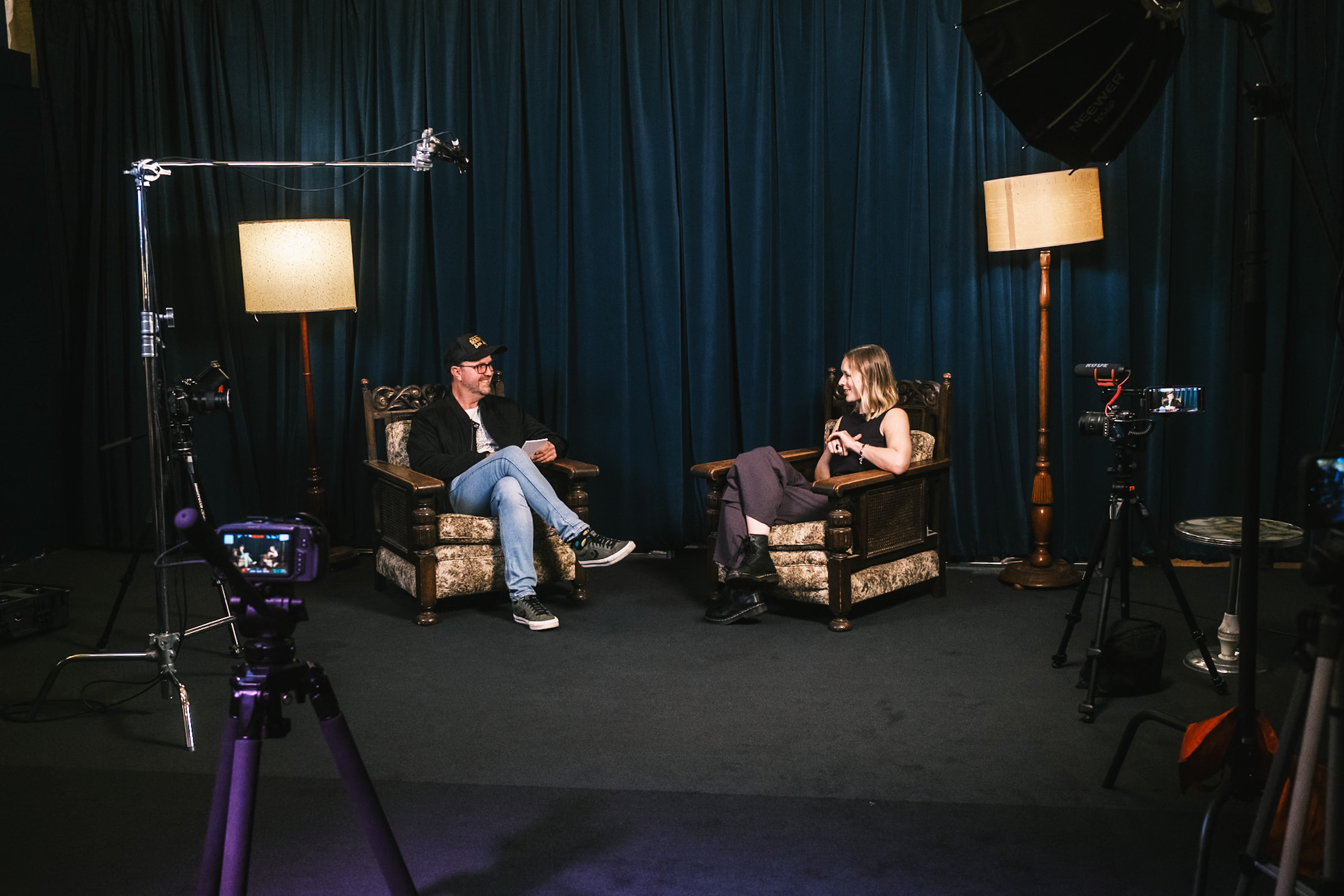 An artist interview being filmed on set at Stage and Storytelling